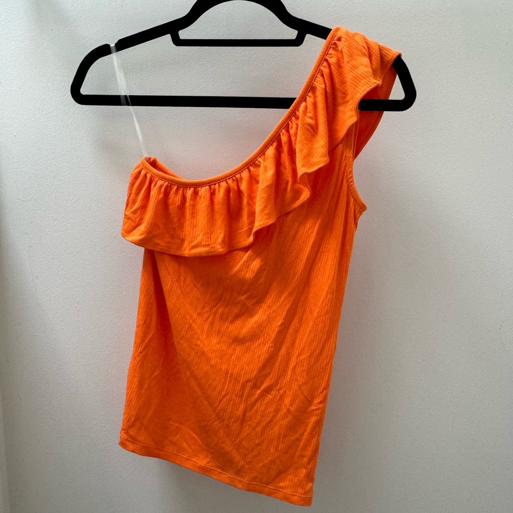 Orange one shoulder top with ruffle detail
